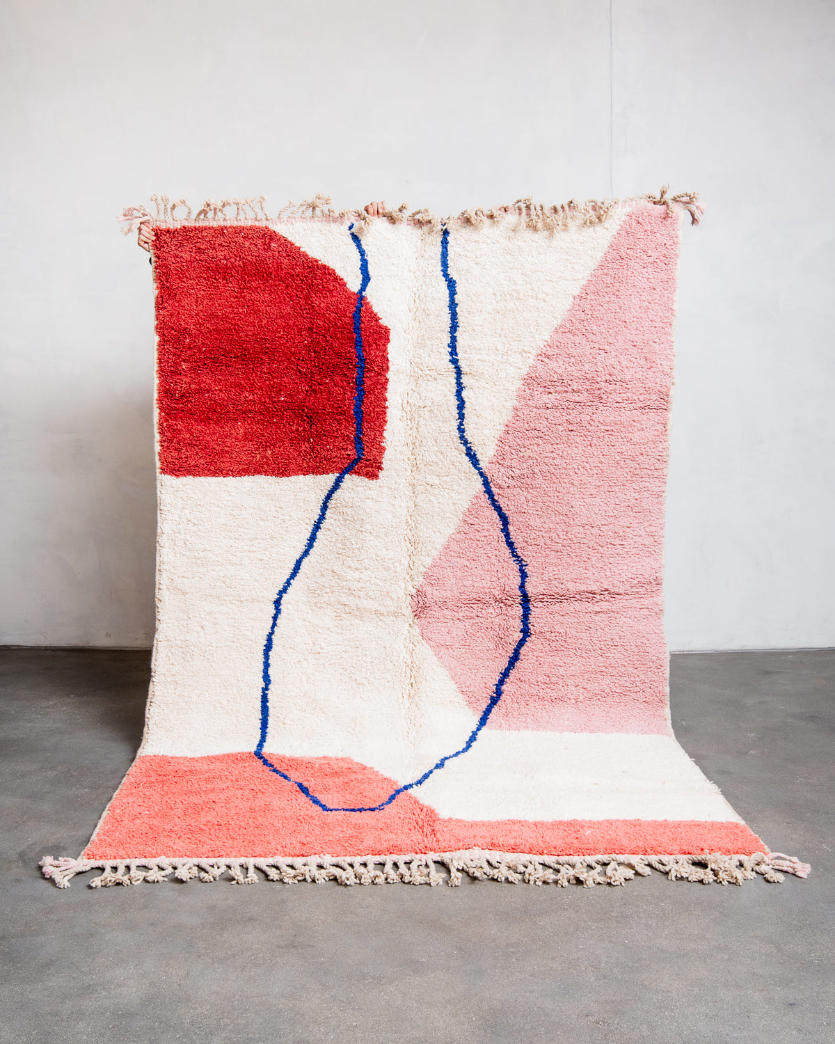 Modern, designer, handcrafted Berber rug from Morocco. Beniourain carpet with beautiful colours and patterns and fluffy wool texture.